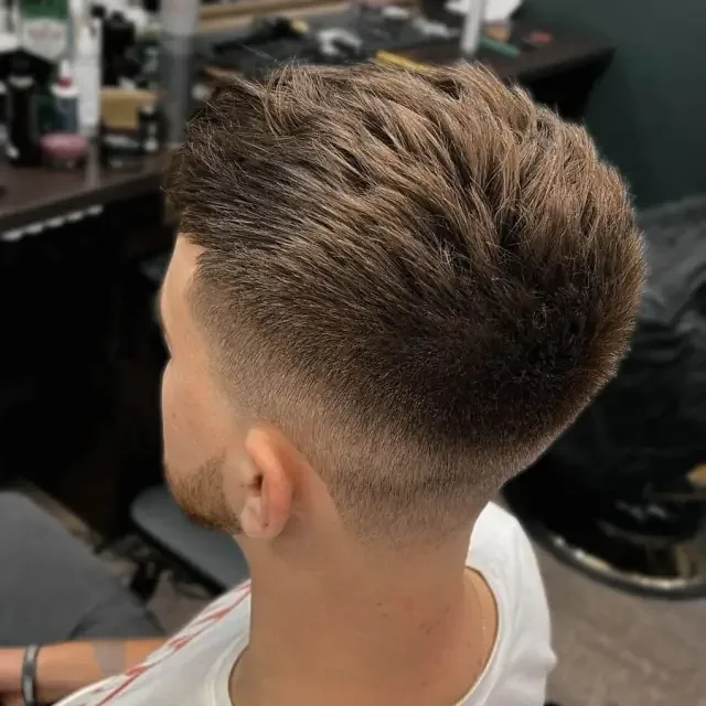 Textured fade back view at Gentlemen Barber Shop Krakow in Kazimierz